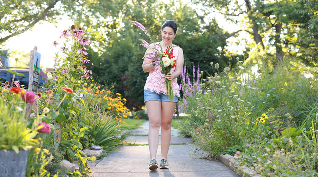 An American Meadows customer holding a beautiful homegrown cut flower bouquet