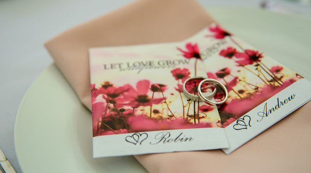 The Let Love Grow Seed Packet has a romantic style, shown here at an American Meadows employee's wedding!