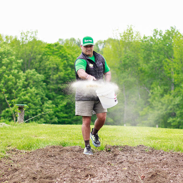 Mike the seed man planting wildflower seed